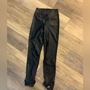 Good American Shiny Black Leggings with cute straps on lower calf. Size 0